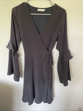 Lush Black Wrap Dress with Ruffled Bell Sleeves